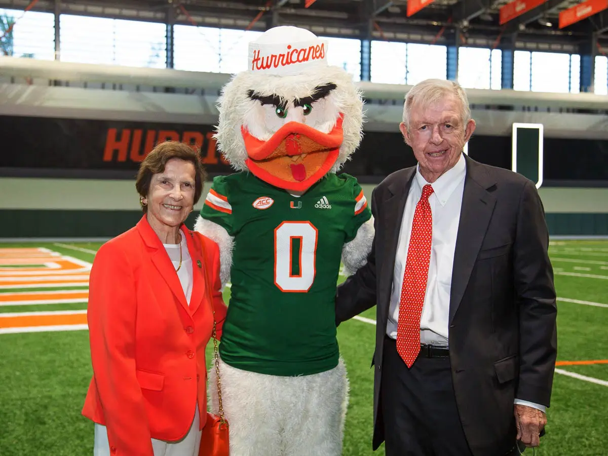 Chuck and sue posing with Sebastian the Ibis 