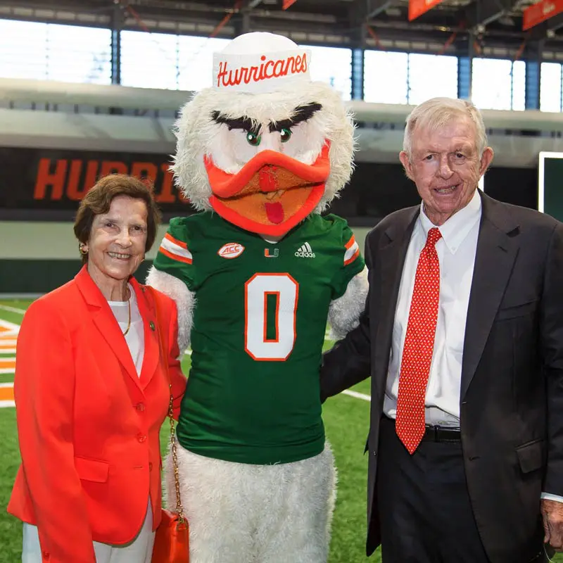 Chuck and Sue posing with Sebastian the ibis