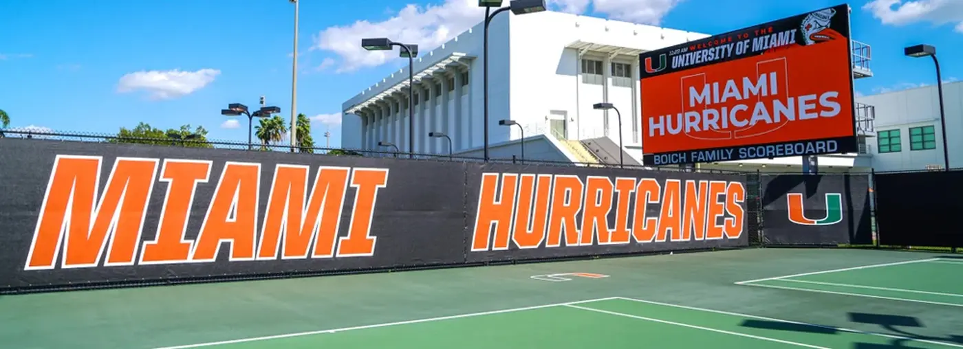 women rowing on the lake